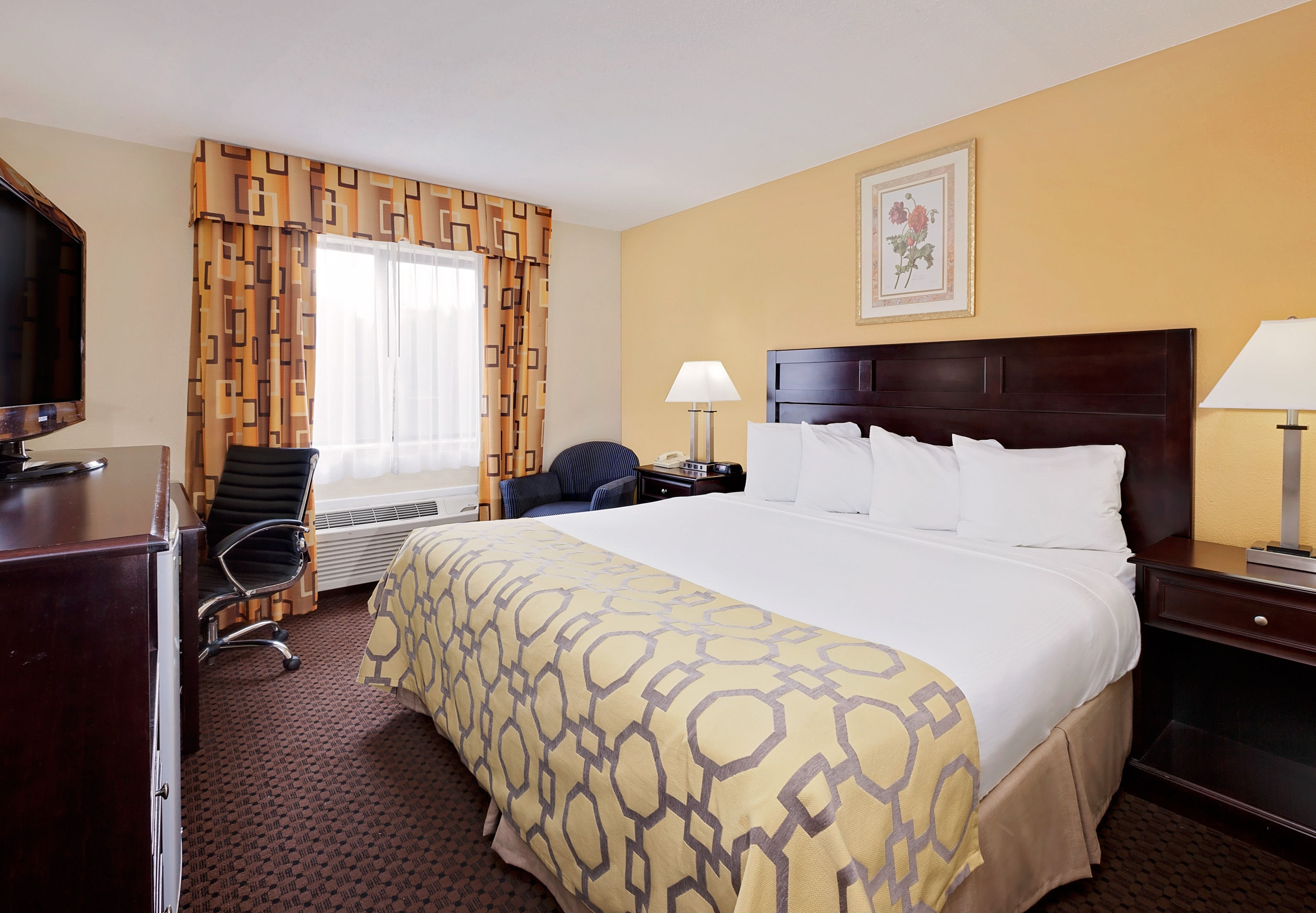 Guest room at the Baymont by Wyndham Battle Creek Downtown in Battle Creek,...