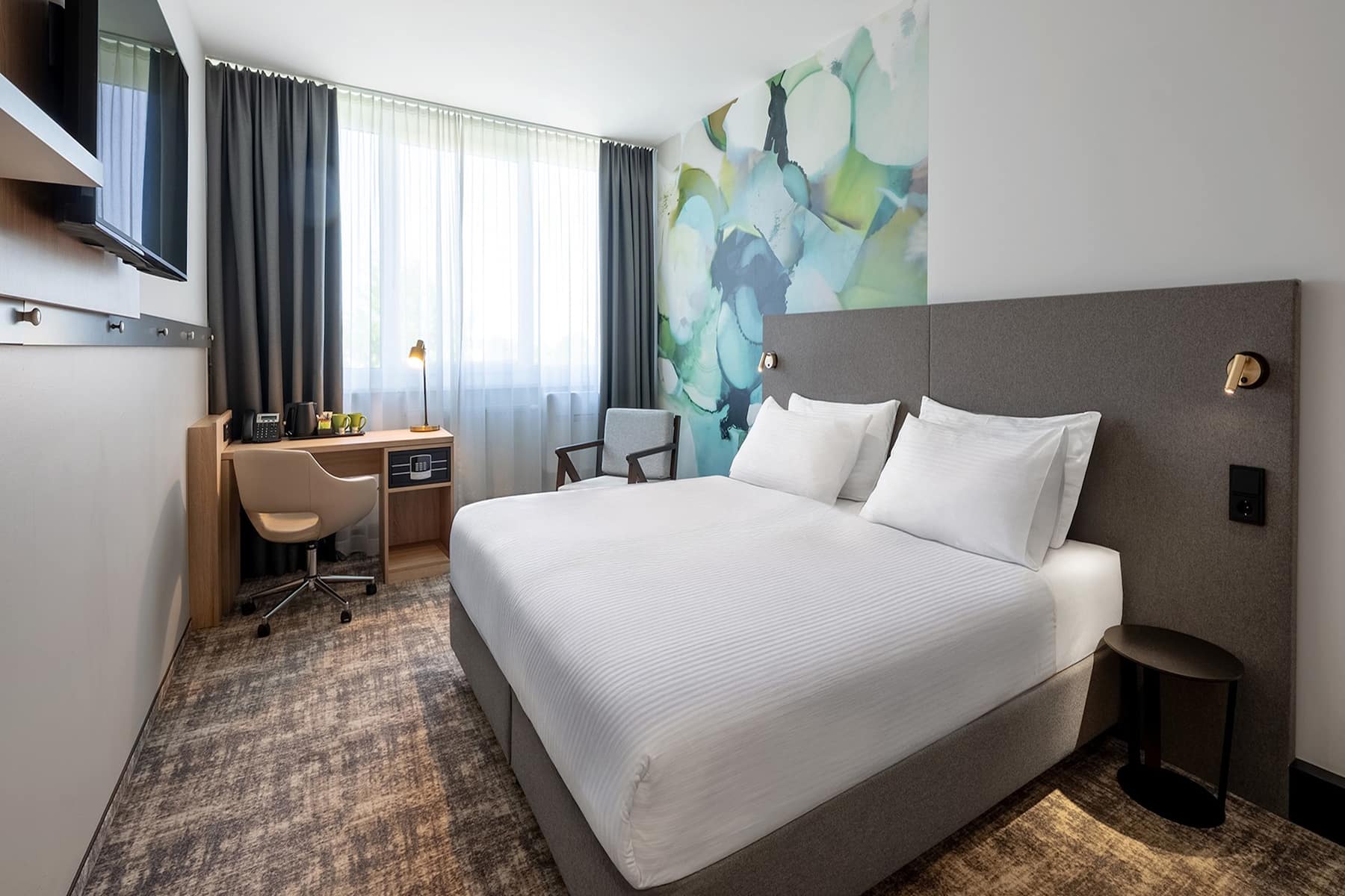 Guest room at the Wyndham Garden Munich Messe in Munich, Other than US/Canada