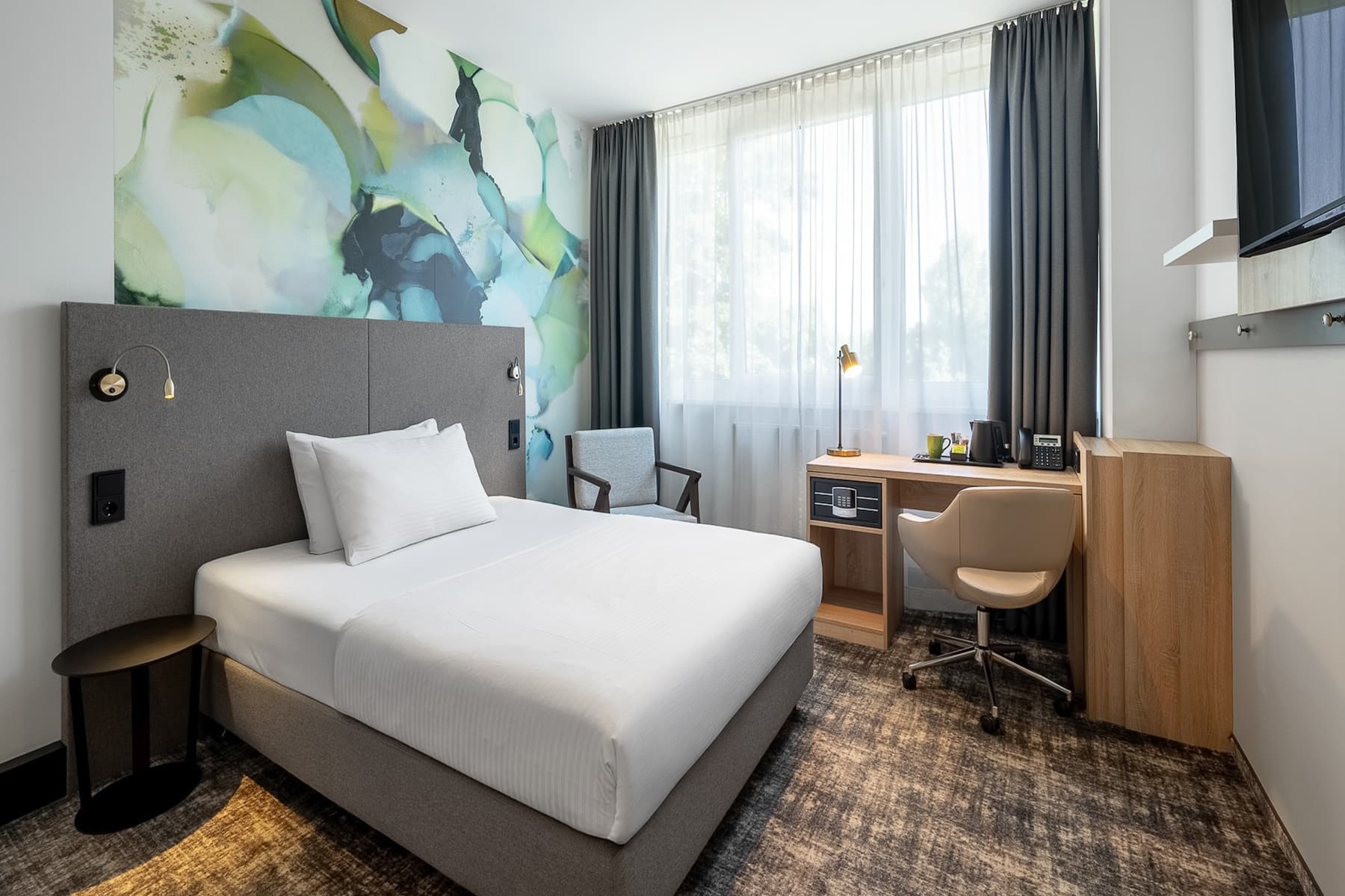 Guest room at the Wyndham Garden Munich Messe in Munich, Other than US/Canada