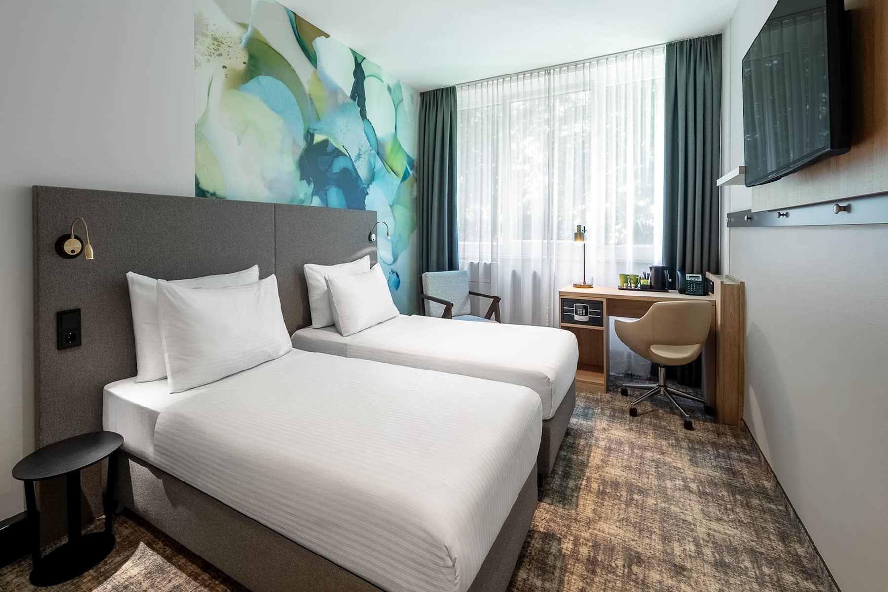 Guest room at the Wyndham Garden Munich Messe in Munich, Other than US/Canada