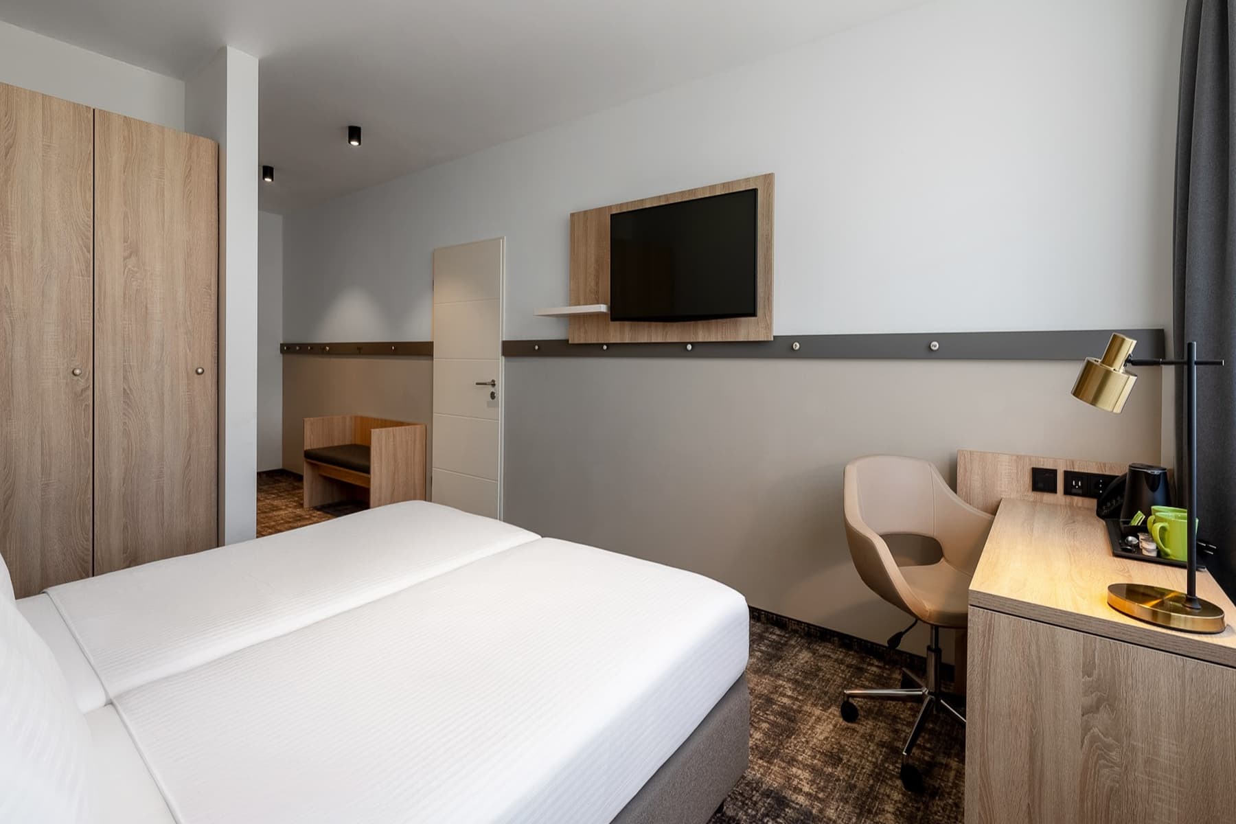 Guest room at the Wyndham Garden Munich Messe in Munich, Other than US/Canada