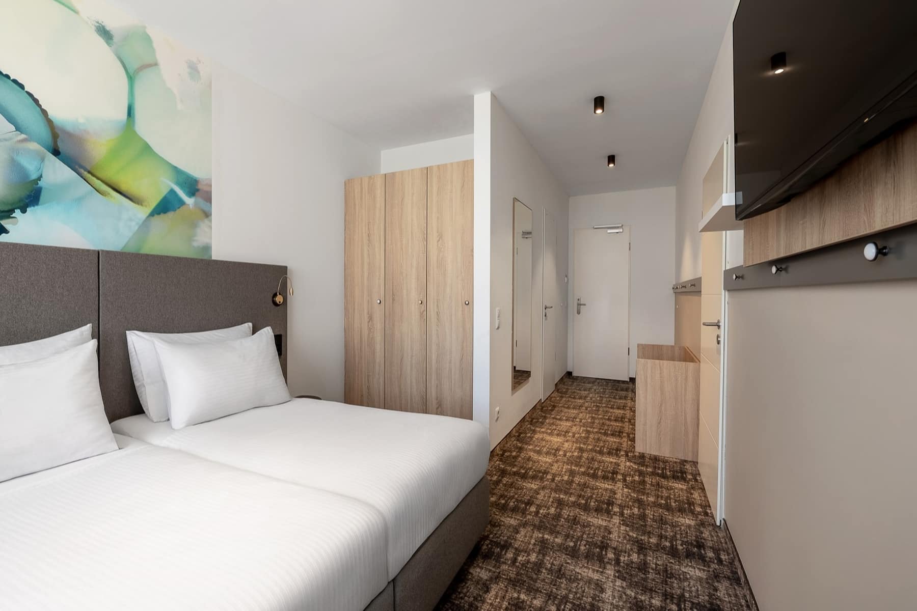 Guest room at the Wyndham Garden Munich Messe in Munich, Other than US/Canada