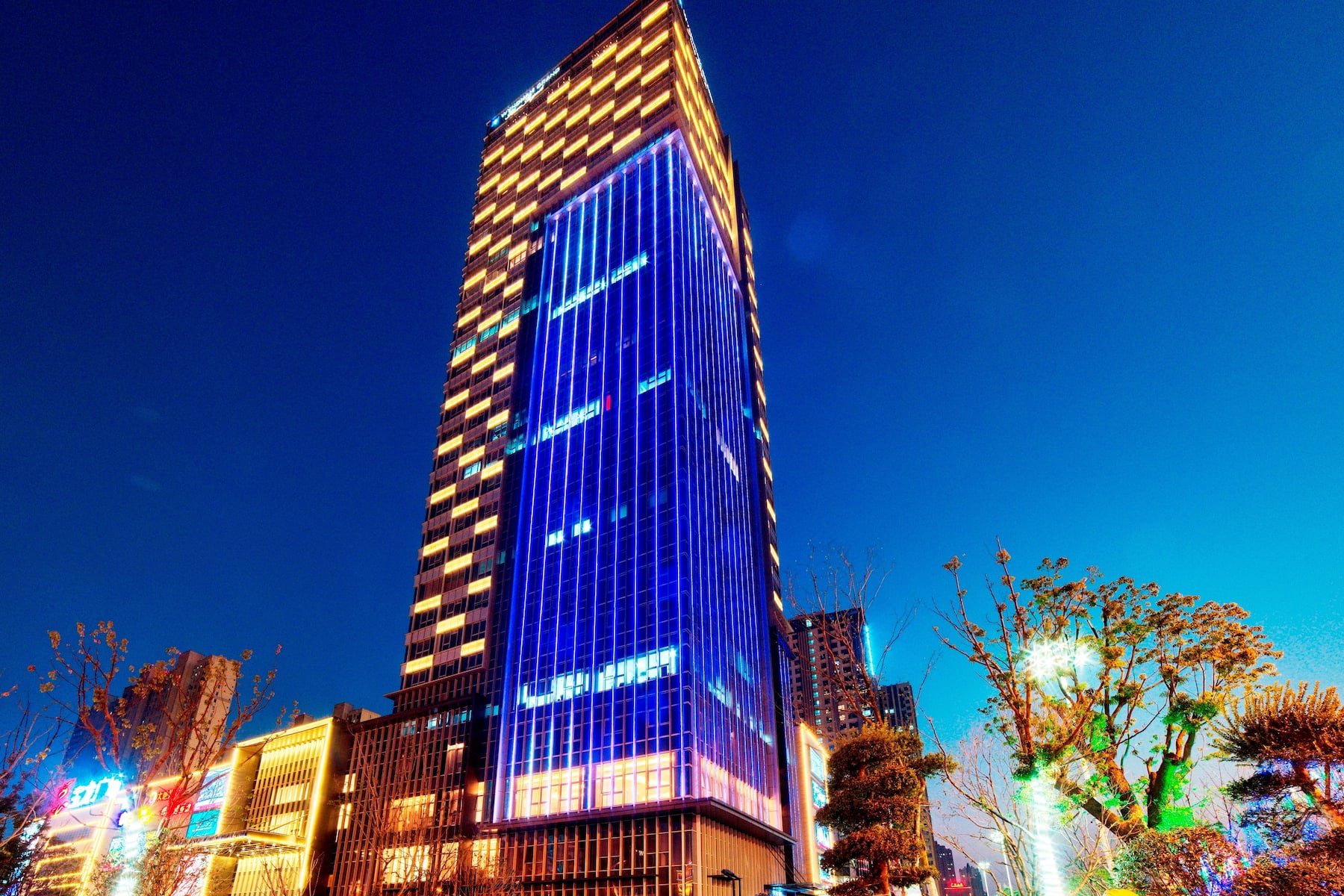 Exterior Dusk Image of Wyndham Grand Plaza Royale Powerlong Fuyang hotel in Fuyang, Other than US/Canada