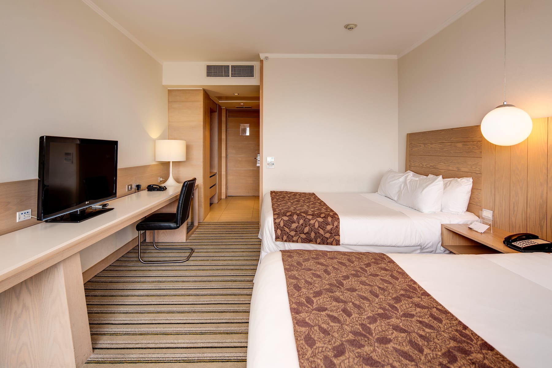 Guest room at the Wyndham Concepcion Pettra in Concepcion, Other than US/Canada