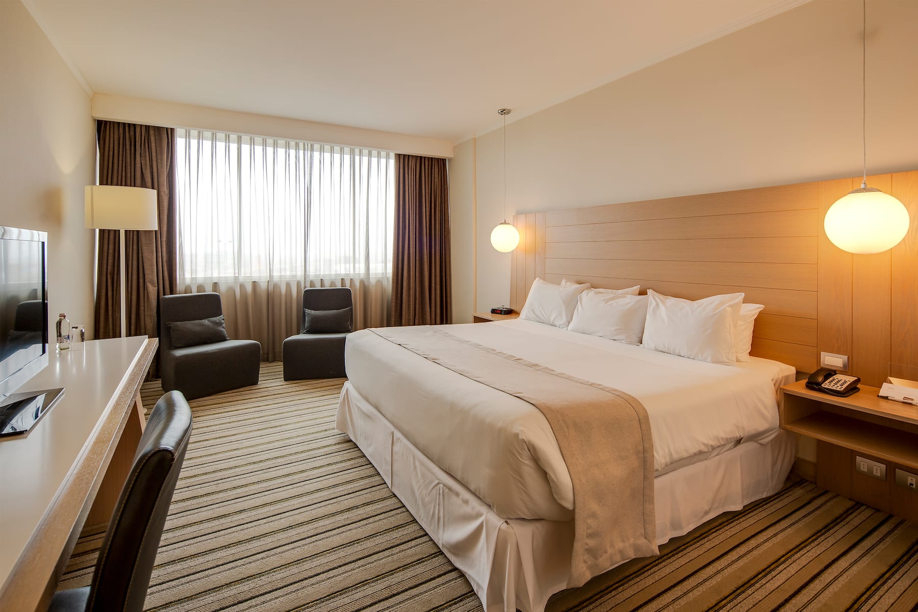 Guest room at the Wyndham Concepcion Pettra in Concepcion, Other than US/Canada