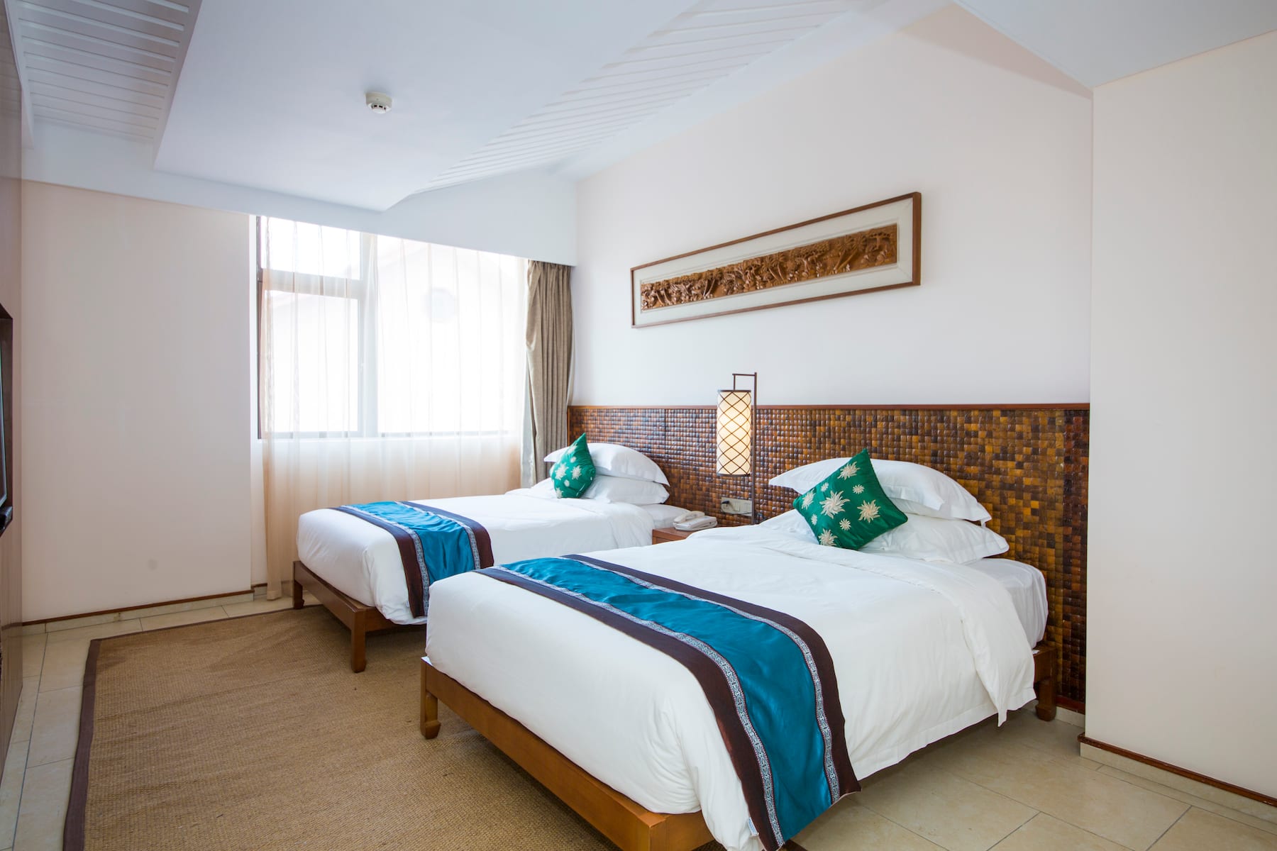 Guest room at the Wyndham Maoming in Maoming, Other than US/Canada