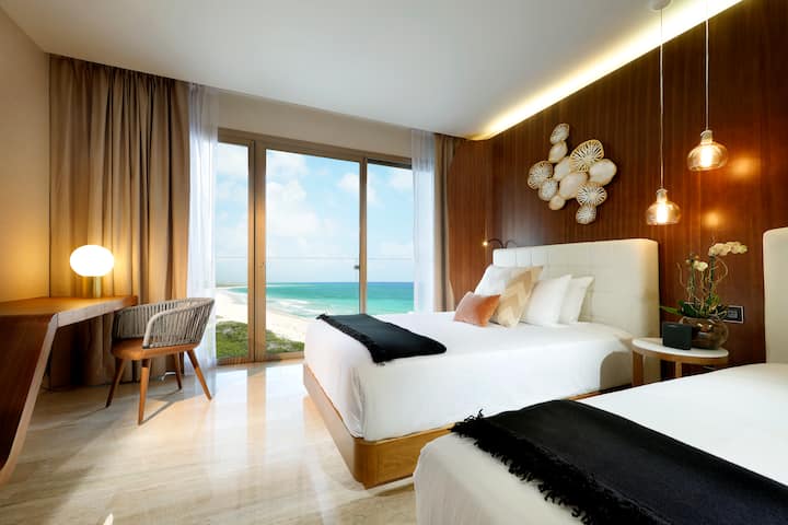 Guest room at the TRS Coral Costa Mujeres, a Registry Collection Hotel in Cancun, Other than US/Canada