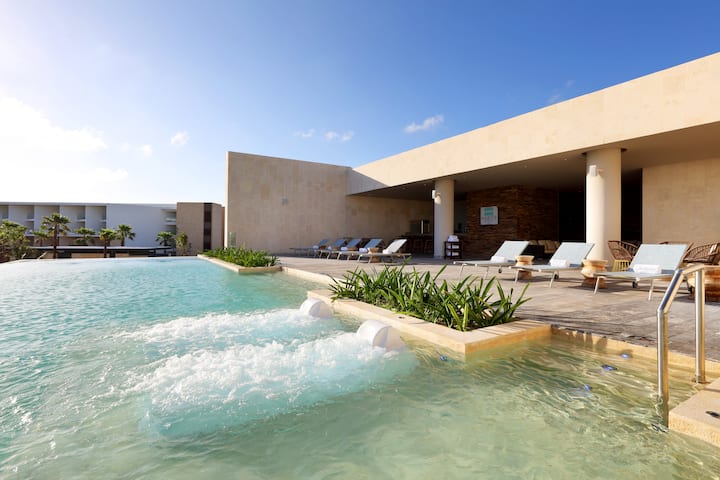 Pool at the TRS Coral Costa Mujeres, a Registry Collection Hotel in Cancun, Other than US/Canada